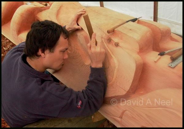 David Neel carving a totem pole
